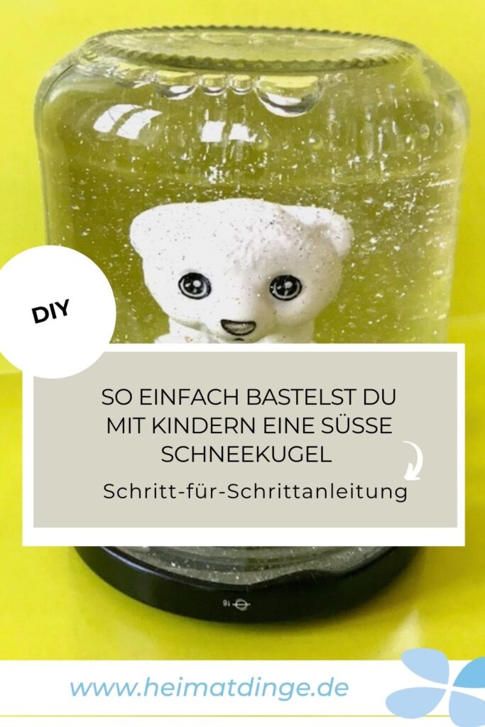 Schneekugel selber machen: einfache Bastelidee fürs Weihnachtsbasteln mit Kindern 8 Upcycling Schneekugel aus Altglas und Lego basteln