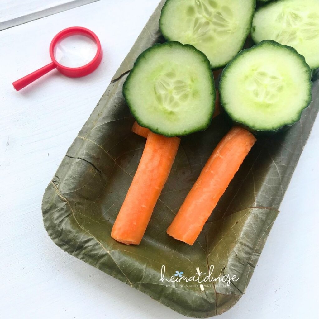 Lupen aus Gurken und Karotten als gesunder Snack für eine Detektiv Party